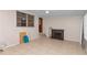 The living room features tile floors, a fireplace, and neutral walls to personalize at 1753 Nw 44Th St, Ocala, FL 34475