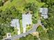 Aerial view of property showcasing the home's layout and surrounding greenery at 195 River Village Drive, Debary, FL 32713