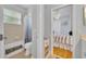 Bathroom with tile floor and shower with view into bedroom at 195 River Village Drive, Debary, FL 32713