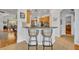 Kitchen breakfast bar with counter seating and pendant lighting at 195 River Village Drive, Debary, FL 32713