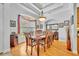 Elegant dining room featuring a large window and stylish chandelier at 195 River Village Drive, Debary, FL 32713