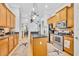 Modern kitchen featuring stainless steel appliances and ample cabinet space at 195 River Village Drive, Debary, FL 32713