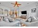 Spacious living room featuring an open concept layout and comfortable seating at 195 River Village Drive, Debary, FL 32713