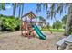 Playground with slide and swing set for to enjoy outdoor activities at 195 River Village Drive, Debary, FL 32713