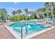 Bright community pool with clear water and lounge chairs for relaxation at 195 River Village Drive, Debary, FL 32713