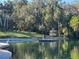 Scenic community area with a natural spring, gazebo, and lush landscaping at 200 Hummingbird Ln, Longwood, FL 32779