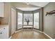 Cozy breakfast nook surrounded by windows, providing ample natural light and a charming view at 2308 Donegan Pl, Orlando, FL 32826