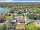 Aerial shot of property in a neighborhood near a lake, highlighting its location and surrounding community at 249 Spartan Dr, Maitland, FL 32751