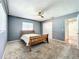 Cozy bedroom featuring carpet floors, neutral paint, and a ceiling fan at 249 Spartan Dr, Maitland, FL 32751