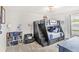 Charming bedroom featuring a stylish bunk bed, playful decor, and carpeted floor at 25537 High Hampton Cir, Sorrento, FL 32776