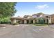 Clubhouse with a covered entryway and manicured landscaping at 25537 High Hampton Cir, Sorrento, FL 32776