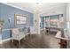 Cozy living room with stylish seating and decorative accents at 25537 High Hampton Cir, Sorrento, FL 32776