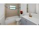 Updated bathroom features a shower-tub combination and new vanity at 2804 Clearfield Ave, Orlando, FL 32808