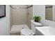 Modern bathroom features a tiled shower and new vanity with stylish fixtures at 2804 Clearfield Ave, Orlando, FL 32808