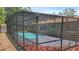 Fully screened-in swimming pool enhances the outdoor living space in the backyard at 2804 Clearfield Ave, Orlando, FL 32808
