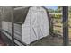 Outdoor shed with double doors and exterior trim at 2804 Clearfield Ave, Orlando, FL 32808
