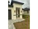 Inviting front entrance with modern exterior paint and a well-maintained lawn at 317 Mandrake St, Orlando, FL 32811