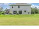Large backyard featuring well maintained lawn and exterior view of the home at 32125 Wekiva Pines Blvd, Sorrento, FL 32776