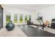 Bright bonus room/home gym with natural light and access to the backyard at 32125 Wekiva Pines Blvd, Sorrento, FL 32776