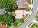 Property line outlined in red showing the home's location, landscaping, and proximity to neighborhood amenities at 3561 Ventura Club Cir, Orlando, FL 32822