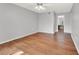 A bedroom with hardwood floors and an ensuite bathroom at 3561 Ventura Club Cir, Orlando, FL 32822