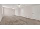 Spacious bedroom with neutral walls, plush carpeting, ceiling fans with lighting, and closet storage at 3561 Ventura Club Cir, Orlando, FL 32822