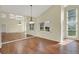 This dining room features hardwood floors, lots of windows and a vaulted ceiling at 3561 Ventura Club Cir, Orlando, FL 32822
