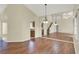 This dining room features hardwood floors and a large mirror at 3561 Ventura Club Cir, Orlando, FL 32822