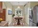 This kitchen nook features a view from the window and a ceiling light at 3561 Ventura Club Cir, Orlando, FL 32822