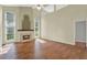 Inviting living room with soaring ceilings, fireplace, and large windows that let in natural light at 3561 Ventura Club Cir, Orlando, FL 32822