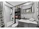 This renovated bathroom includes subway tiles, updated vanity, and modern fixtures at 36607 E Eldorado Lake Dr, Eustis, FL 32736