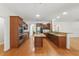 Well-appointed kitchen with stainless steel appliances, granite countertops, and ample cabinet space at 4200 Joslyn Ln, Lady Lake, FL 32159