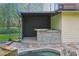 Charming poolside bar with stone accents offers the perfect setting for outdoor relaxation and entertaining at 4200 Joslyn Ln, Lady Lake, FL 32159