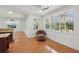Cozy sitting area with large windows providing views of the screened lanai at 4200 Joslyn Ln, Lady Lake, FL 32159