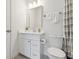 Bathroom with white vanity, modern mirror, and shower at 464 W Plant St, Winter Garden, FL 34787