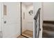 Home elevator, with wood-look floors, is located next to a stairway at 464 W Plant St, Winter Garden, FL 34787