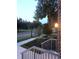 Landscaped front yard with sidewalks, greenery, and exterior lighting at 464 W Plant St, Winter Garden, FL 34787