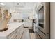 Spacious kitchen with a large center island, modern appliances, and ample storage space at 464 W Plant St, Winter Garden, FL 34787