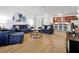 Bright living room flowing into a modern kitchen, featuring stylish furnishings and an open concept design at 5024 Shoreway Loop # 10106, Orlando, FL 32819
