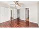 This bedroom features gleaming wood floors, closet, and a ceiling fan at 546 Northbridge Dr, Altamonte Springs, FL 32714