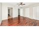 Bedroom with hardwood floors, ceiling fan, closet space, and access to other rooms at 546 Northbridge Dr, Altamonte Springs, FL 32714