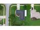 Aerial view of the house showing the roof and landscaping of the property at 5929 Hatteras Dr, Port Orange, FL 32127