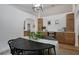 Light and bright dining room area with views into other rooms at 5929 Hatteras Dr, Port Orange, FL 32127