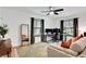 Bright office with hardwood floors, neutral decor, and view to the yard at 5929 Hatteras Dr, Port Orange, FL 32127