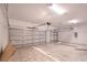 Spacious three-car garage with two garage doors, ready for parking and storage at 6929 Sw 130Th Lane Rd, Ocala, FL 34473