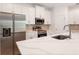 Elegant kitchen with a center island, modern stainless steel appliances, and stylish white cabinetry at 6929 Sw 130Th Lane Rd, Ocala, FL 34473