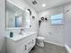 Bathroom featuring cabinet sink, mirror, and shower at 7033 Lakner Way, Orlando, FL 32822