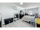 Bedroom featuring bed and dresser with light gray floors at 7033 Lakner Way, Orlando, FL 32822