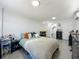 Bedroom with bed, nightstand, dresser, and connected bath at 7033 Lakner Way, Orlando, FL 32822