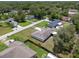 High-angle aerial view of a single-Gathering home highlighting its location within the surrounding residential area at 7360 Canal Dr, Sanford, FL 32771